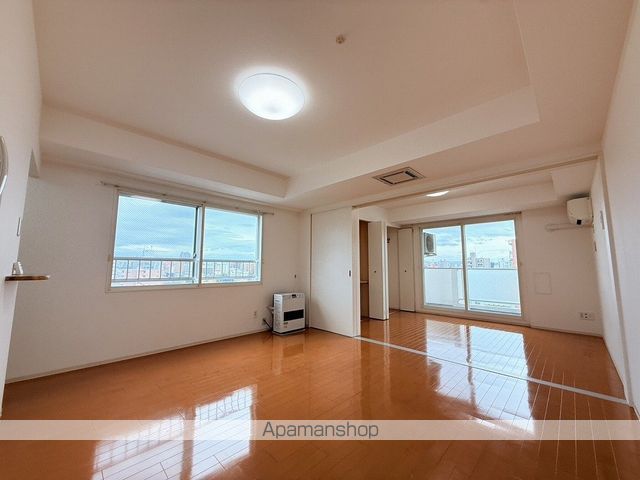 グランカーサ南9条の居間写真