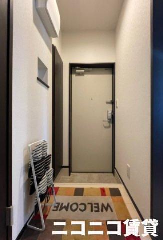 玄関　モデルルームの写真のため、現状を優先致します。