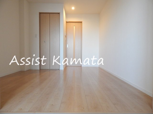 居室・リビング　写真は同タイプの別号室です