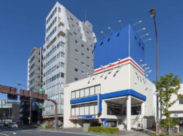 ショッピングセンター　洋服の青山文京千石駅前店（ショッピングセンター）まで467m