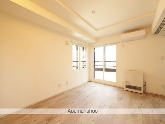 アルファスクエア円山4条の居間写真