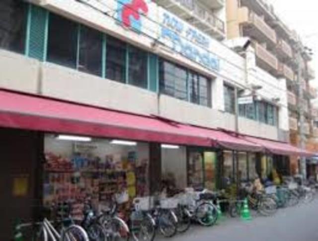 スーパー　万代塚本店（スーパー）まで696m