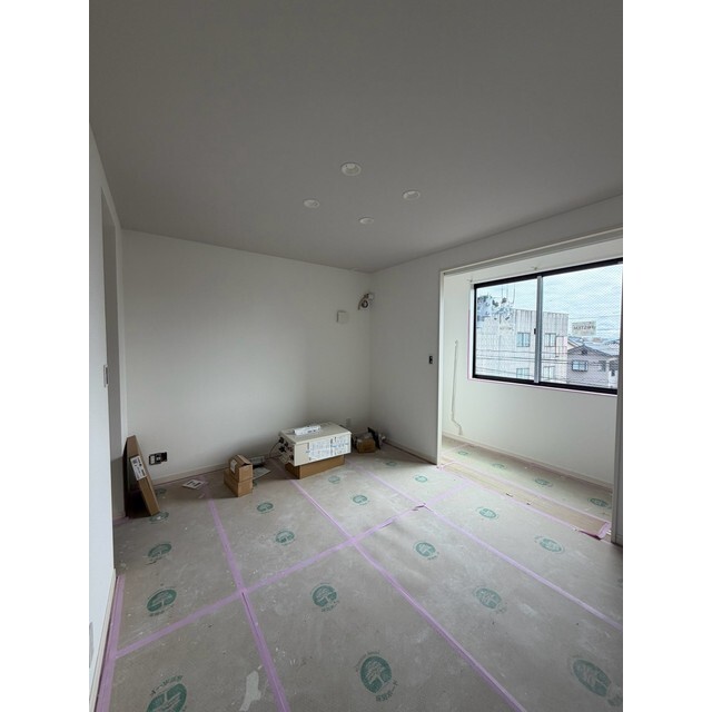 Rooms万代5の居間写真