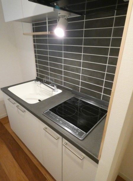 オーパスホームズ三田のキッチン写真