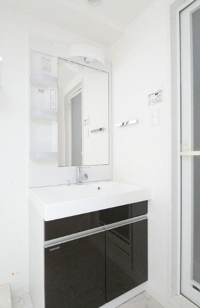 洗面設備　※別部屋の参考写真です。