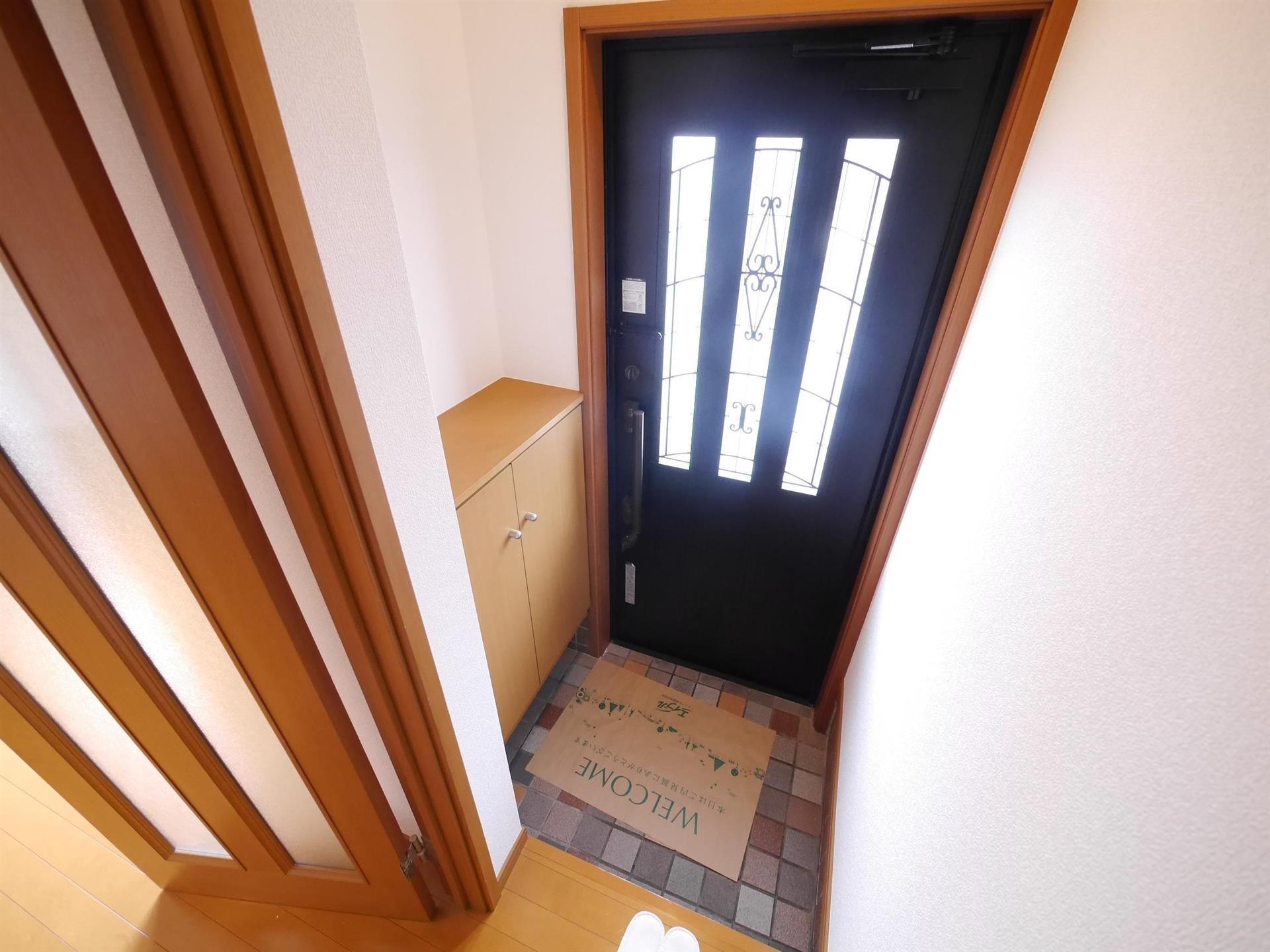 ニューメゾネット本城αIIの玄関写真
