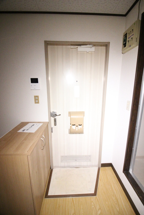 コ-ポ城山の玄関写真