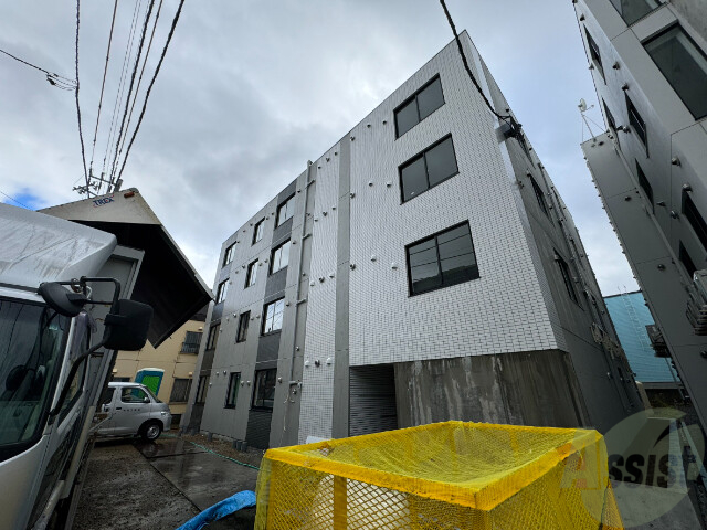 【札幌市豊平区月寒西一条のマンションの建物外観】