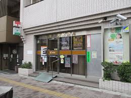郵便局　台東千束郵便局（郵便局）まで404m