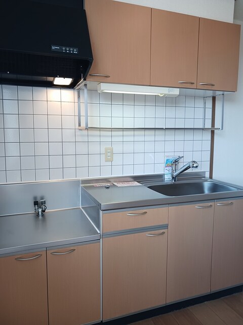 その他　ファミリーマート半田板山町店まで574m