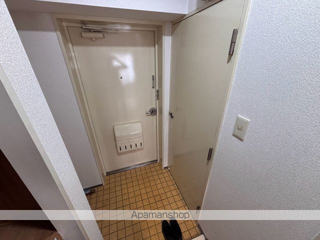 コープ野村万代の玄関写真