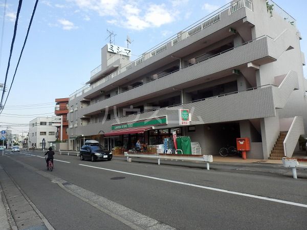 コンビニ　ローソンストア100 川崎登戸店（コンビニ）まで703m