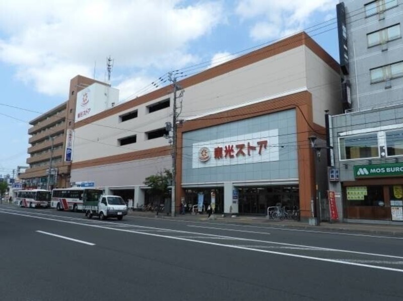 スーパー　東光ストア麻生店（スーパー）まで542m