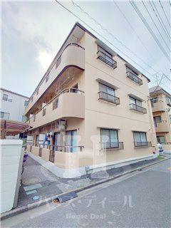 川口市芝中田のマンションの建物外観