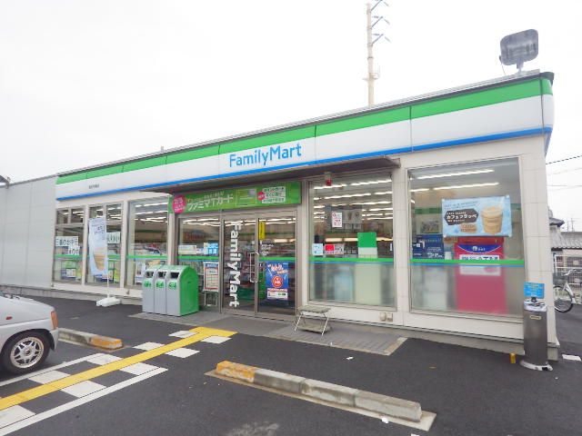 コンビニ　ファミリーマート 高田市場店（コンビニ）まで1069m