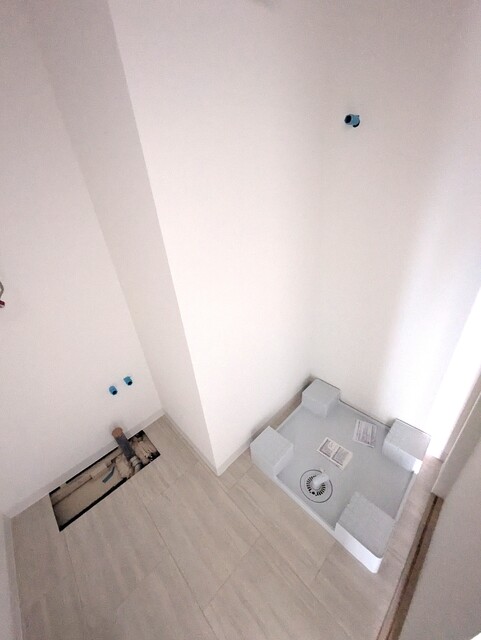 洗面設備　建築中の２０２号の写真