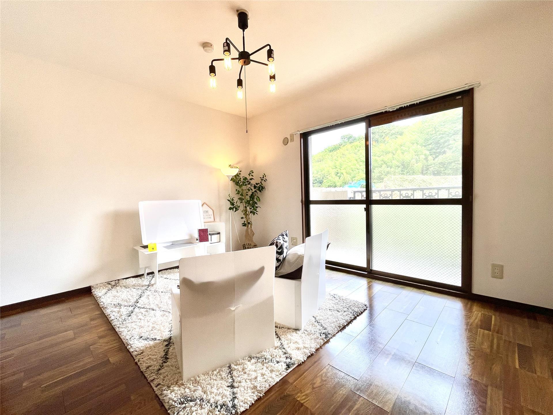 居室・リビング　写真は302号室のものになります。