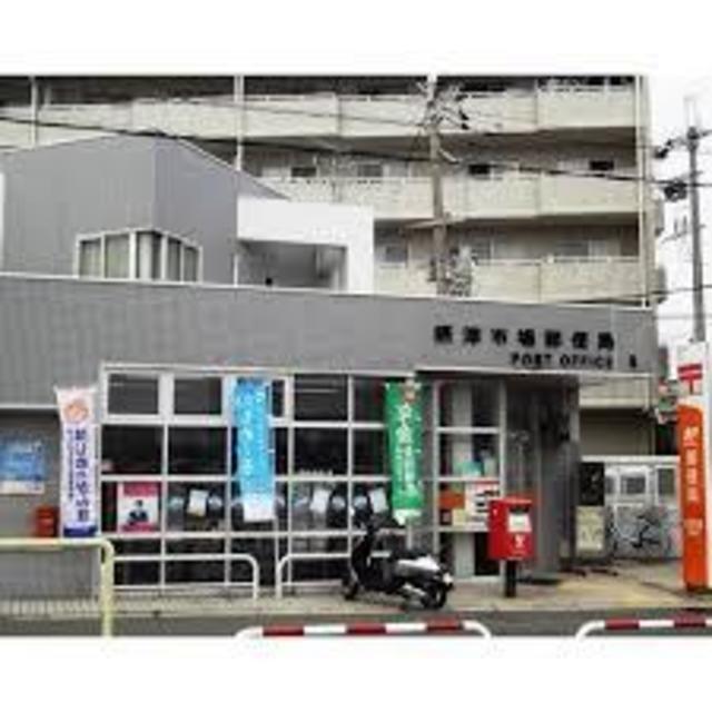 郵便局　摂津市場郵便局（郵便局）まで408m