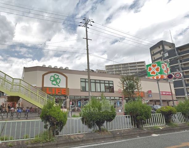 スーパー　ライフ　十三東店（スーパー）まで590m