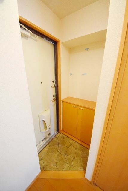 玄関　お問い合わせはタウンハウジング