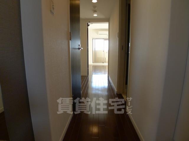 地下鉄長堀鶴見緑地線 ドーム前千代崎駅 徒歩4分 11階建 築19年の居間写真