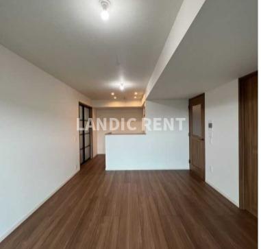 グランドメゾン浄水ガーデンシティ セントラルフォレストIIの居間写真