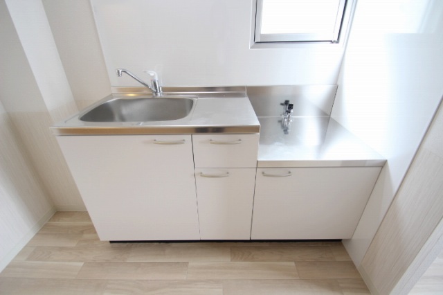 キッチン　同物件、別号室の写真