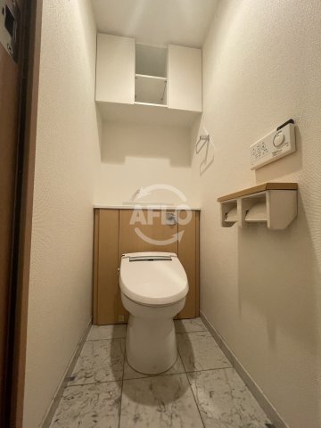 トイレ　リーガル福島駅前　温水洗浄便座