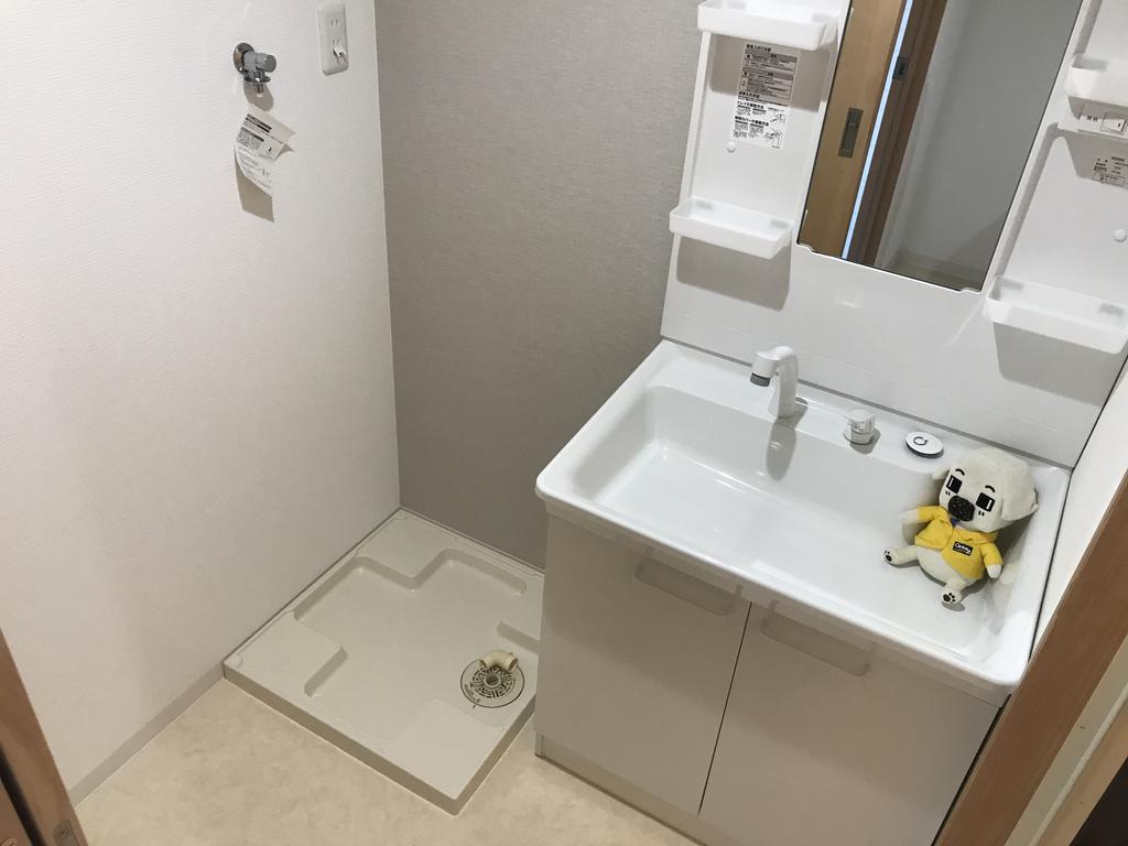 洗面設備　同マンション反転タイプの写真です。