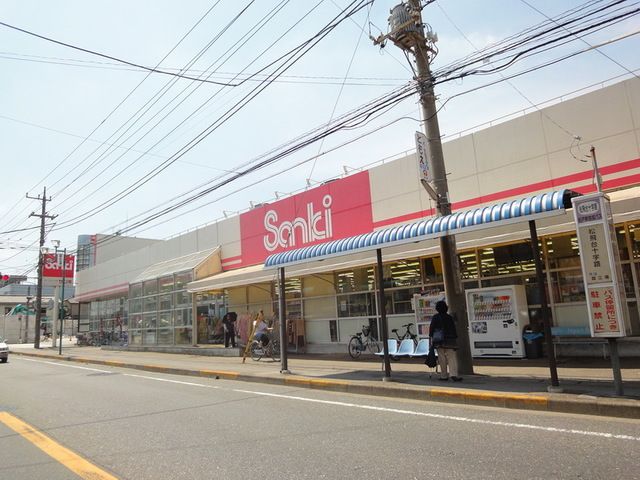 ショッピングセンター　サンキ松飛台店（ショッピングセンター）まで970m