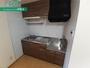 キッチン　同物件別部屋の写真