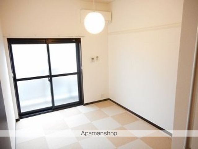 レオパレスホワイトヒルズIIの居間写真