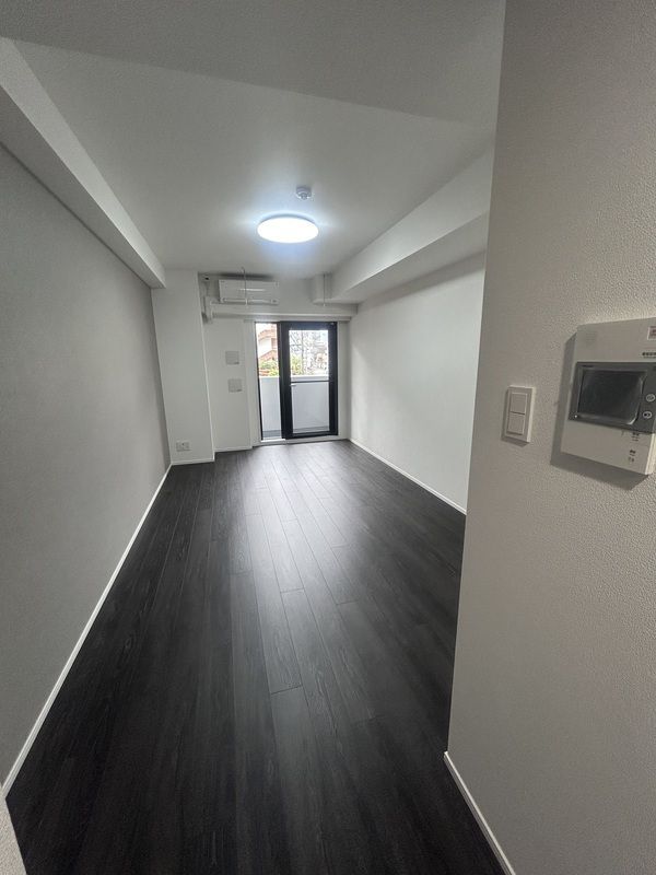 RELUXIA CITY 北新宿の居間写真