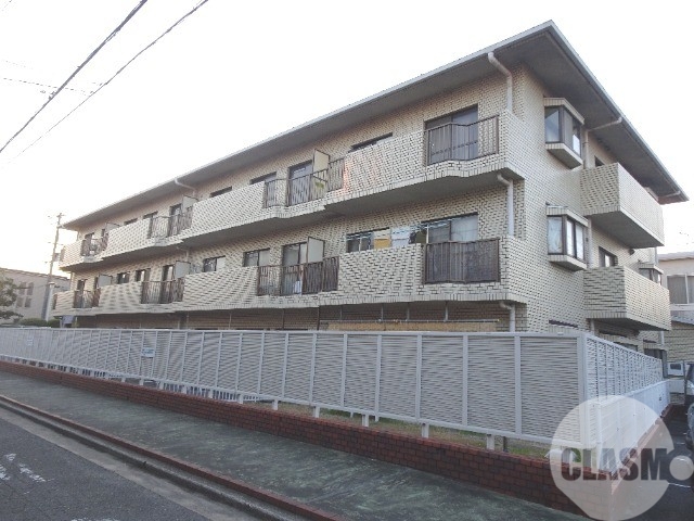 堺市西区浜寺諏訪森町中のマンションの建物外観