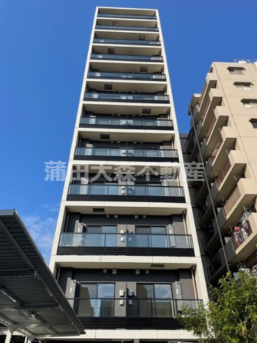 建物外観　2022年11月築　RC鉄筋コンクリート造地上12階建て1K