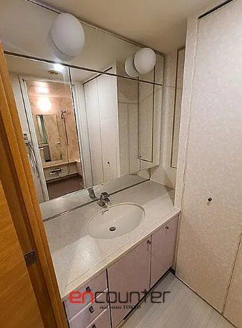 洗面設備　※同マンション別室参考写真