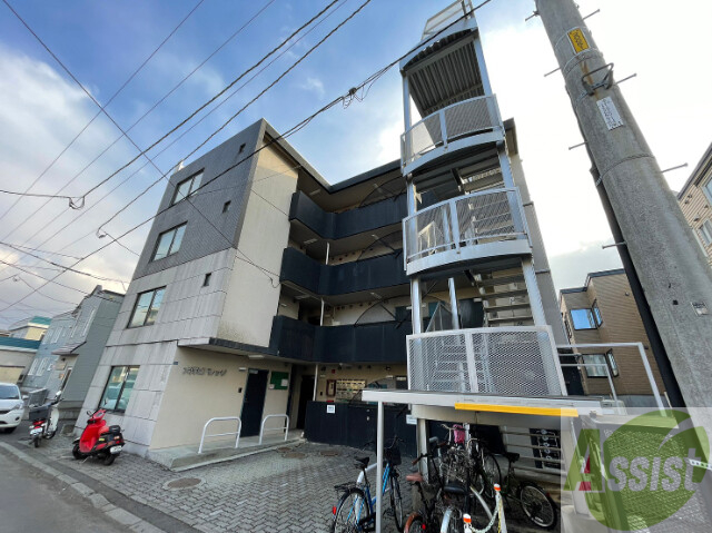 【札幌市北区麻生町のマンションの建物外観】