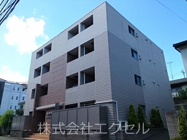 多摩市乞田のマンションの建物外観