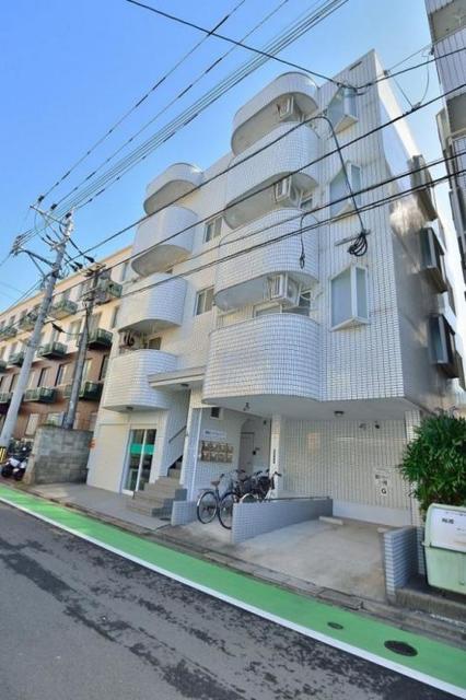建物外観　【外観写真】清潔感のある白で統一されたこだわりのマンション