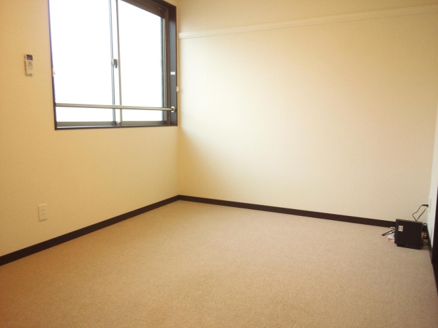 居室・リビング　写真は別号室のものです。