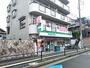 コンビニ　ファミリーマート牧落駅前店（コンビニ）まで1702m