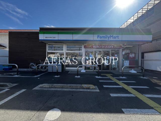 コンビニ　ファミリーマート 越谷大沢四丁目店（コンビニ）まで734m