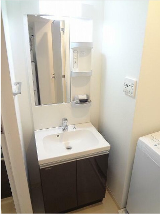 洗面設備　※別部屋の参考写真です。