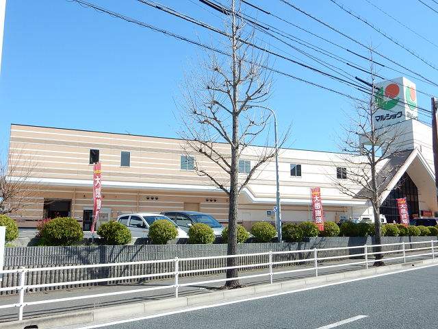 スーパー　マルショク富野店（スーパー）まで599m