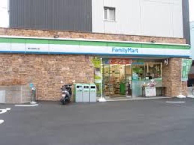 コンビニ　ファミリーマート豊中西緑丘店（コンビニ）まで844m