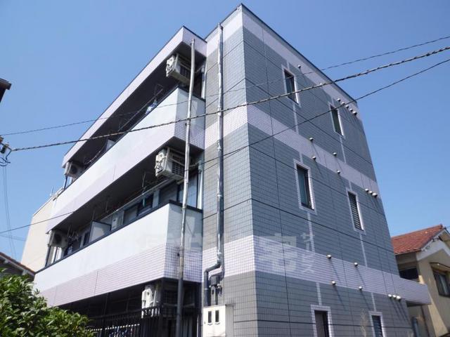 京都市伏見区深草大亀谷西久宝寺町のマンションの建物外観