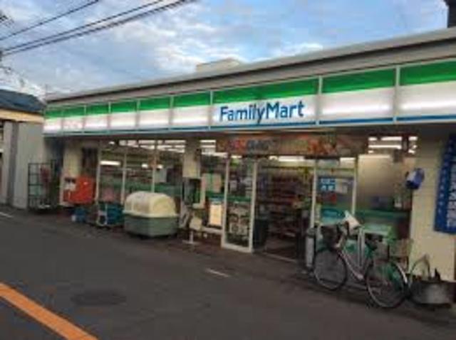コンビニ　ファミリーマート日下中島一丁目店（コンビニ）まで882m