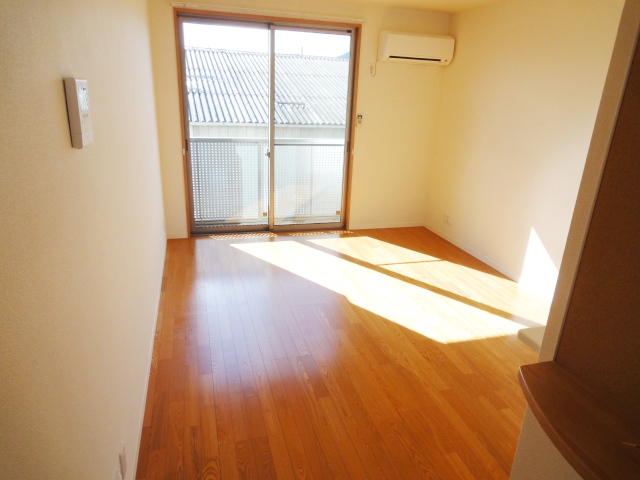 居室・リビング　写真は別号室のものです。