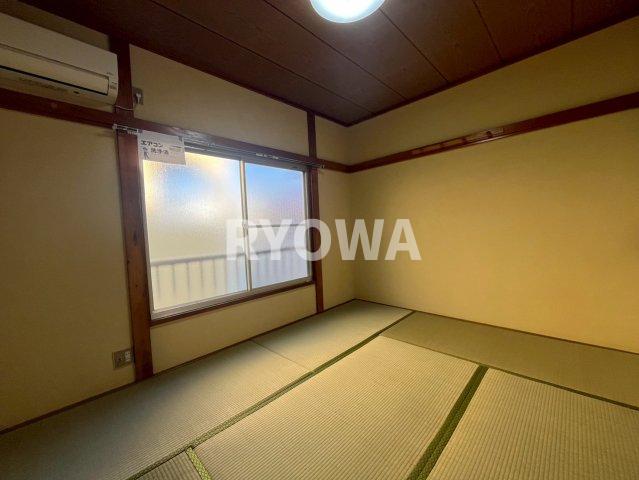 第一コーポ有美の居間写真