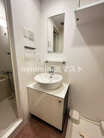 洗面設備　※同マンション別間取り参考写真です